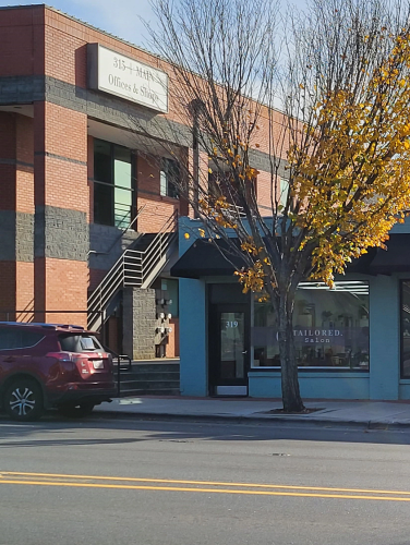 Exterior shot of McCoy's Barbershop and the former Pineville Post Office