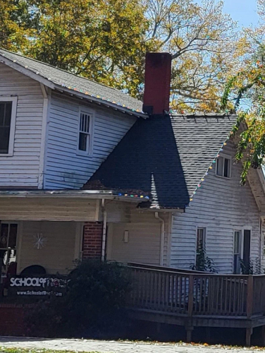 Exterior front view of the two story Fidler House