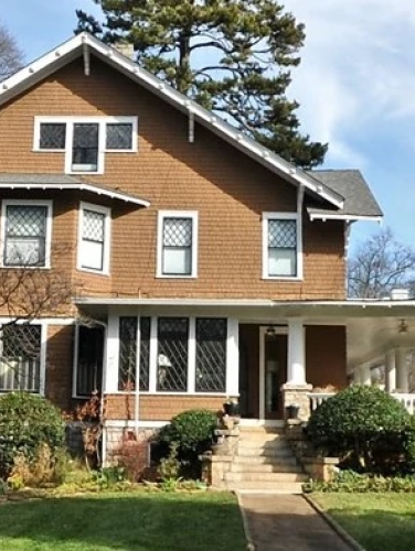 Exterior view of the John Baxter Alexander House on a sunny day