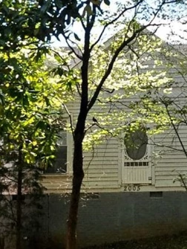 Exterior view of the Atherton Mill House on a sunny day.