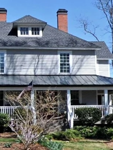 Exterior view of the Hoyle House on a sunny day.
