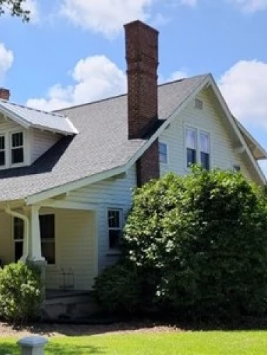 Exterior view of the Phillips House and Morris Barn