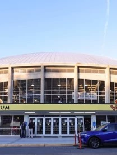 Charlotte Coliseum on a sunny day