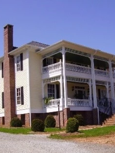 Side view of the Rone House on a sunny day